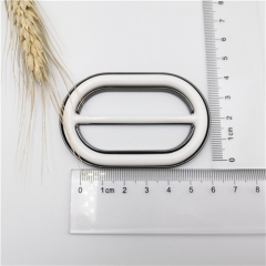 white oval metal buckle for garment