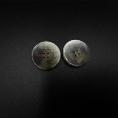 Round resin four-hole buttons