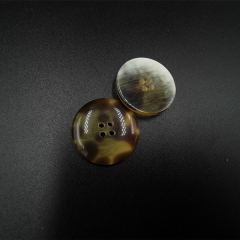 Round resin four-hole buttons