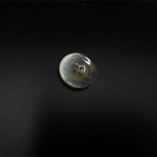 Round resin four-hole buttons