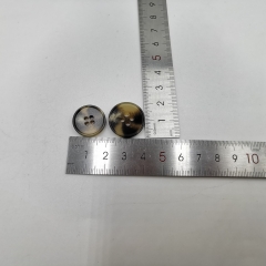 Four eye resin button with stick and flower pattern