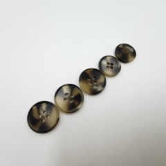 Four eye resin button with stick and flower pattern